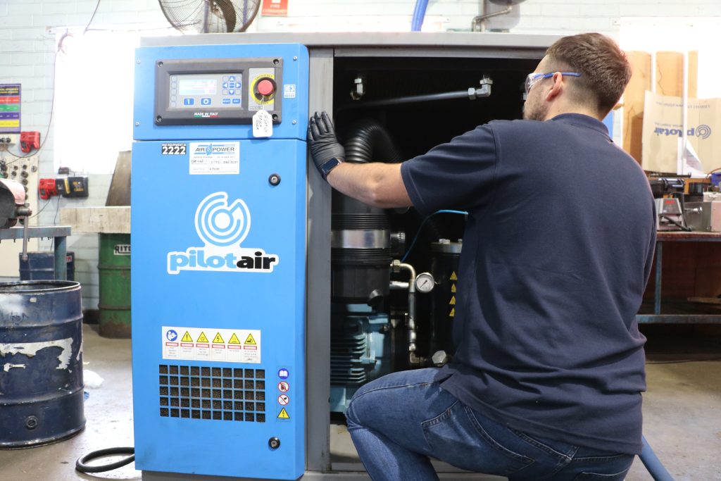 image of pilot air compressor being serviced